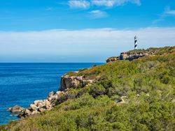 Cala Portinax bay with beautiful azure blue sea water