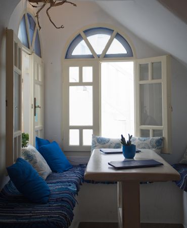 Blue coloured inside seating by the window