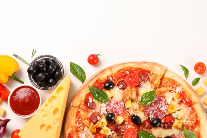 Flat lay. Pizza and ingredients: vegetables, cheese on plain background, copy space