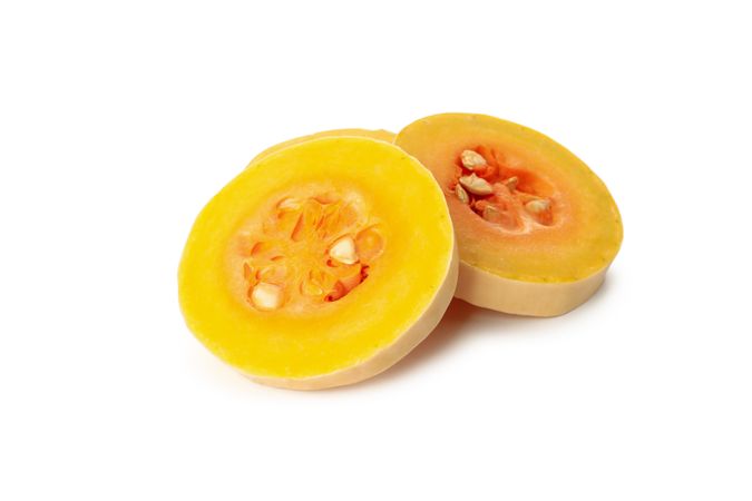 Butternut squash and seeds isolated on blank background
