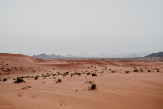 Sunset sky over hills in desert