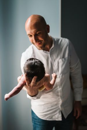Father holding baby