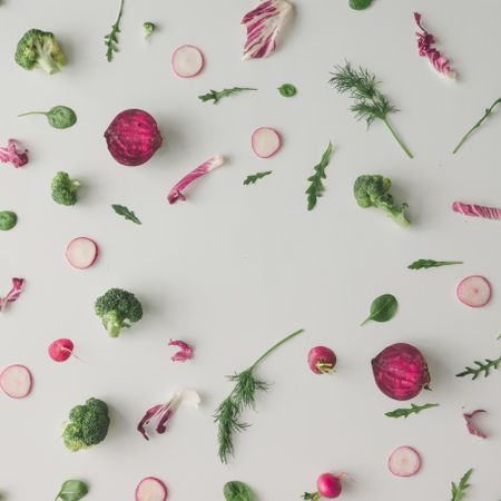 Colorful vegetable pattern made of broccoli, dill, beetroot and radish