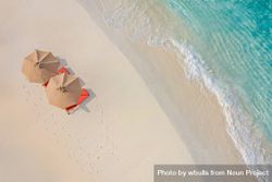 Overhead shot of parasols and reclining chairs on the beach, landscape 417VL0