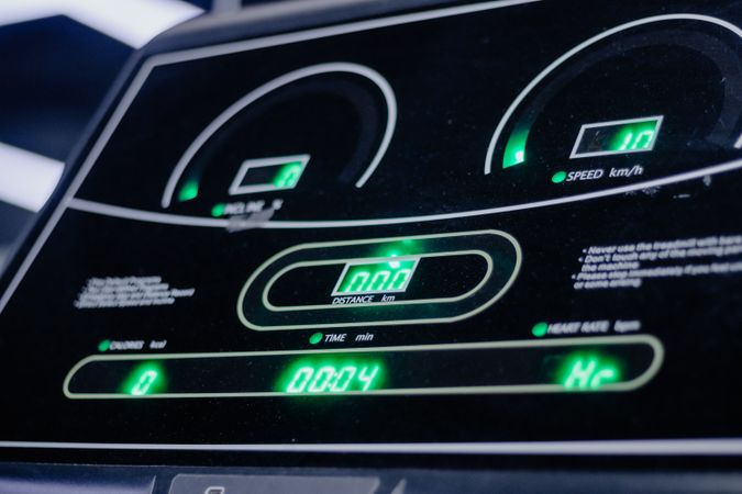 Close-up on Treadmill Display Screen Showing Workout Metrics