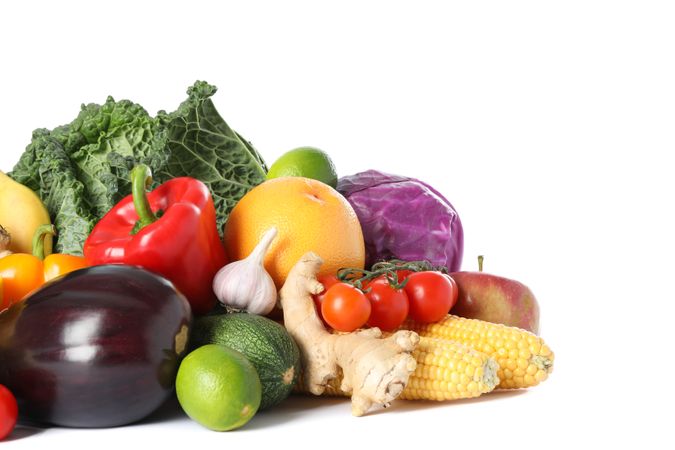 Composition with fresh vegetables and fruits isolated on blank background
