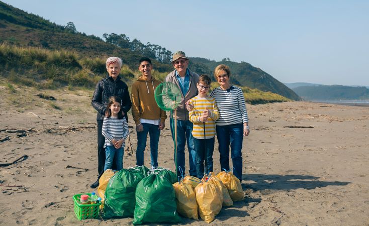 Volunteers posing after cleaning the beach