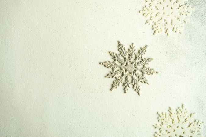 Top view of decorative snow flakes with copy space