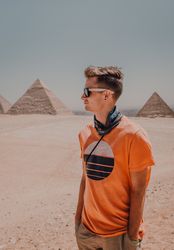 Young man against Great Pyramids