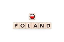 Wooden blocks bearing the name and flag of Poland.