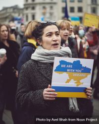 London, England, United Kingdom - March 5 2022: Woman with “We are with you Ukraine” sign bxnEB5