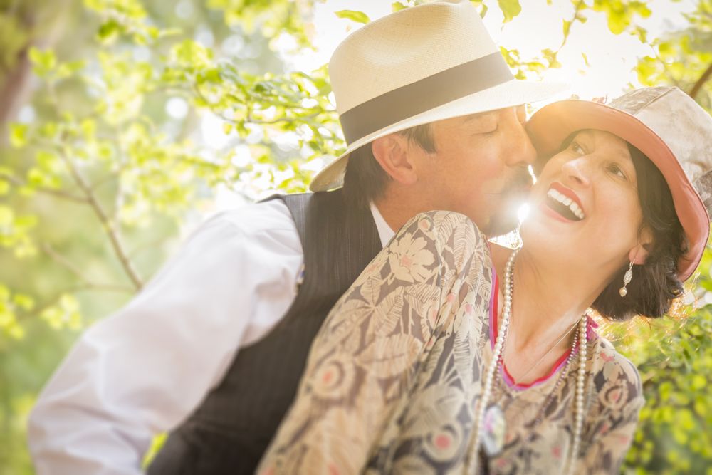 1920s Dressed Romantic Couple Kissing Outdoors
