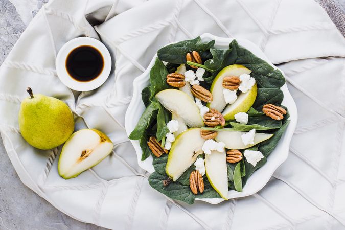 Served pears with pecan and soy sauce