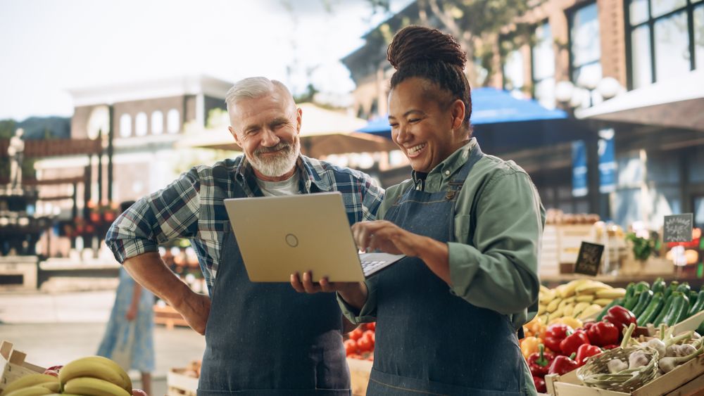 Partners Working at a Farmers Market.