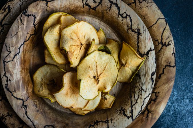 Apple chips in rustic bowl