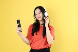 Asian Young Female Woman Wearing Headphone Smartphone Listen Music
