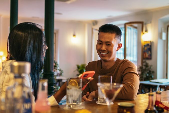 Interracial couple dating using smartphone