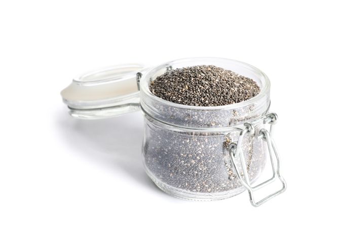 Chia seeds in glass jar isolated on plain background
