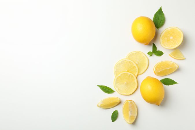 Fresh lemons on light background, top view. Ripe fruit