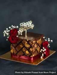 Square chocolate cake with happy birthday sign 0VdBY4