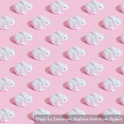 Bunny rabbits in rows on pink background 0PMm75