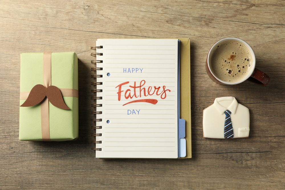 Happy father's day inscription, inscription in notebook, with gifts.