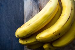 Bunch of bananas with some bruising