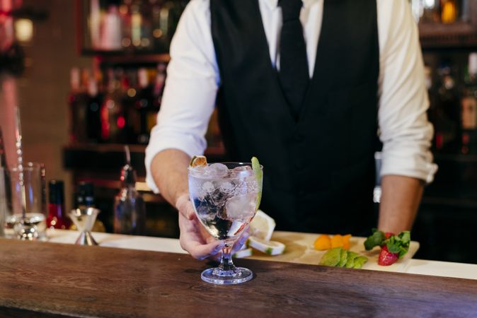 Barman working making drinks