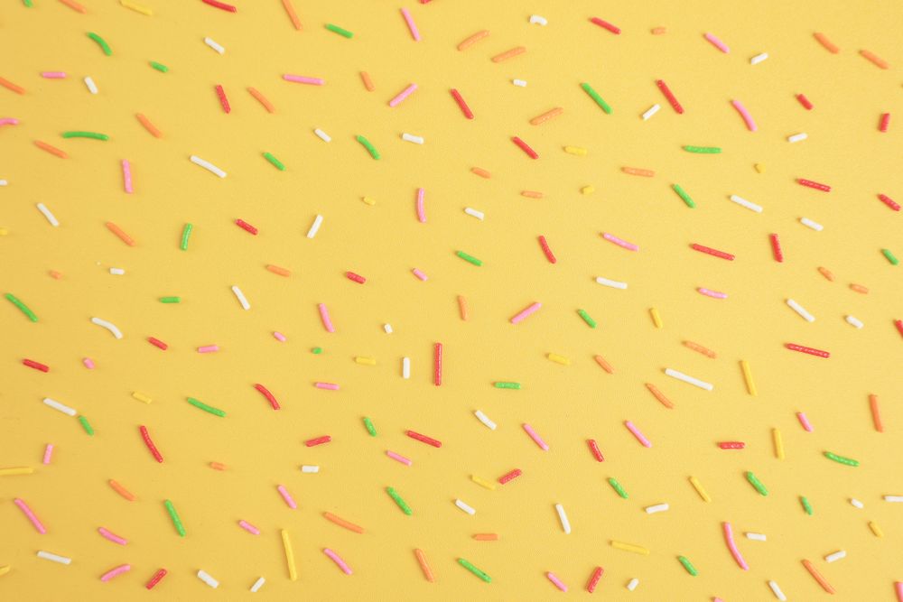 Colorful Sprinkle on Yellow Background, Rainbow Hagelslag Pattern