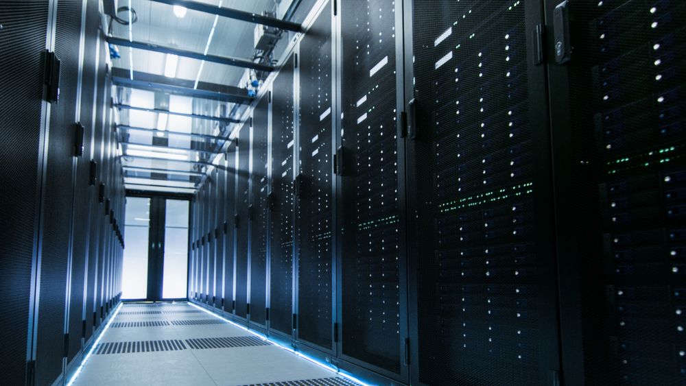 Shot of a Working Data Center With Rows of Rack Servers.