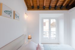 Cozy bedroom with big bed