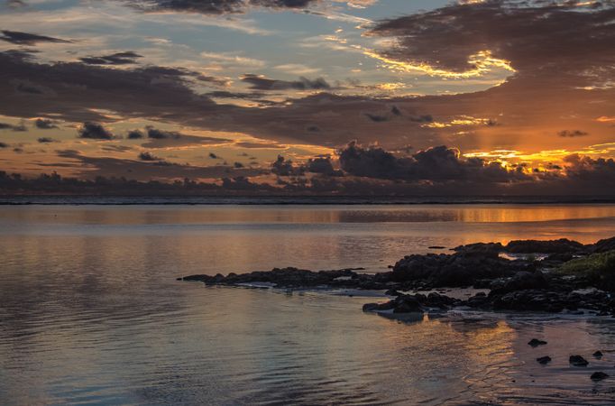 Beautiful colorful sky reflected in a Mauritius Beach