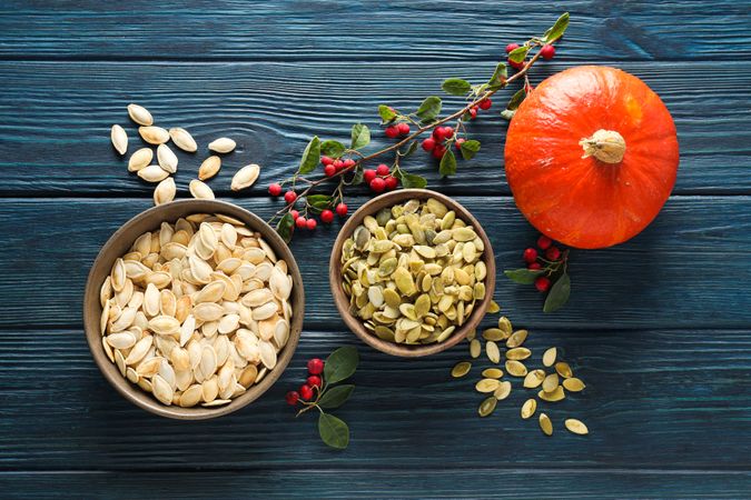 Cooking ingredients for fall season - pumpkin seeds, pumpkin