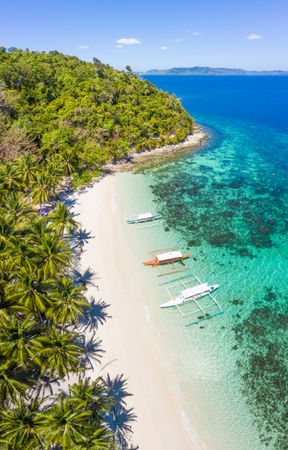 Aerial view of tropical island with blue water