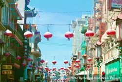 Red and green Chinese lanterns decorating the street 4dgmA5