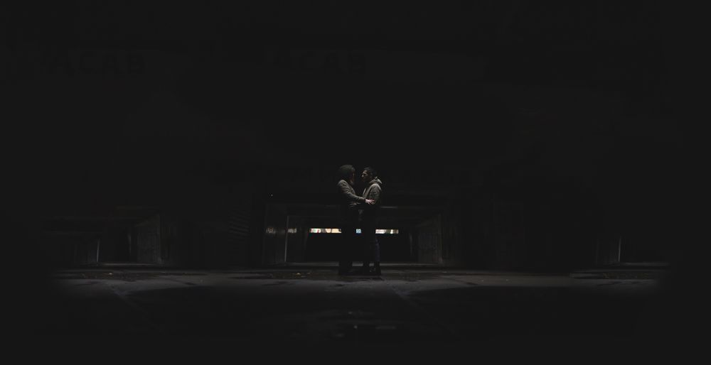 A couple holding each other.