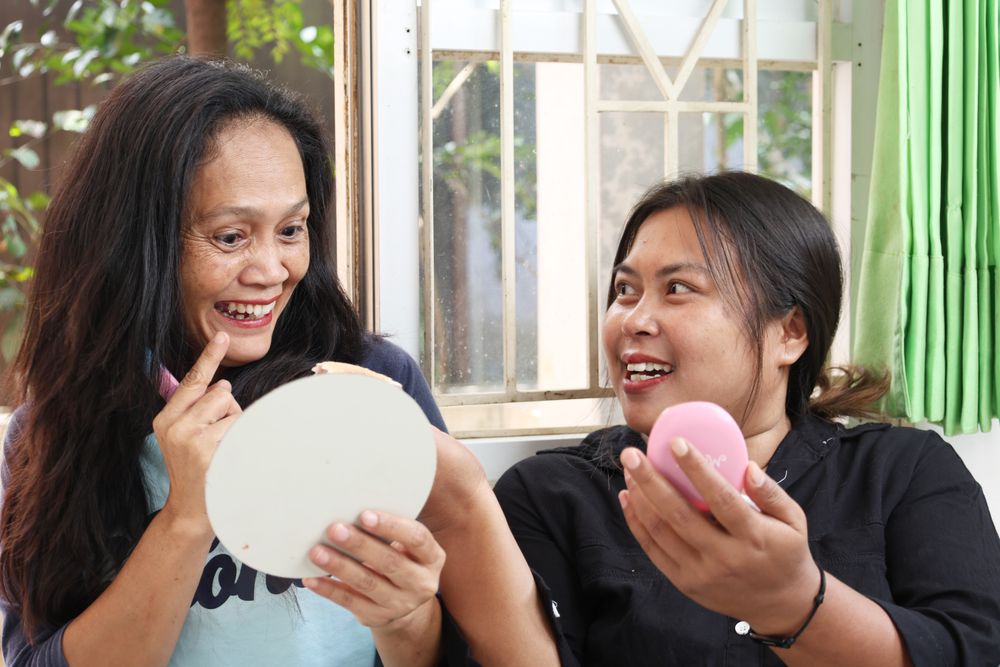 Two Asian Indonesian Woman Chatting About Make Up, Lipstick