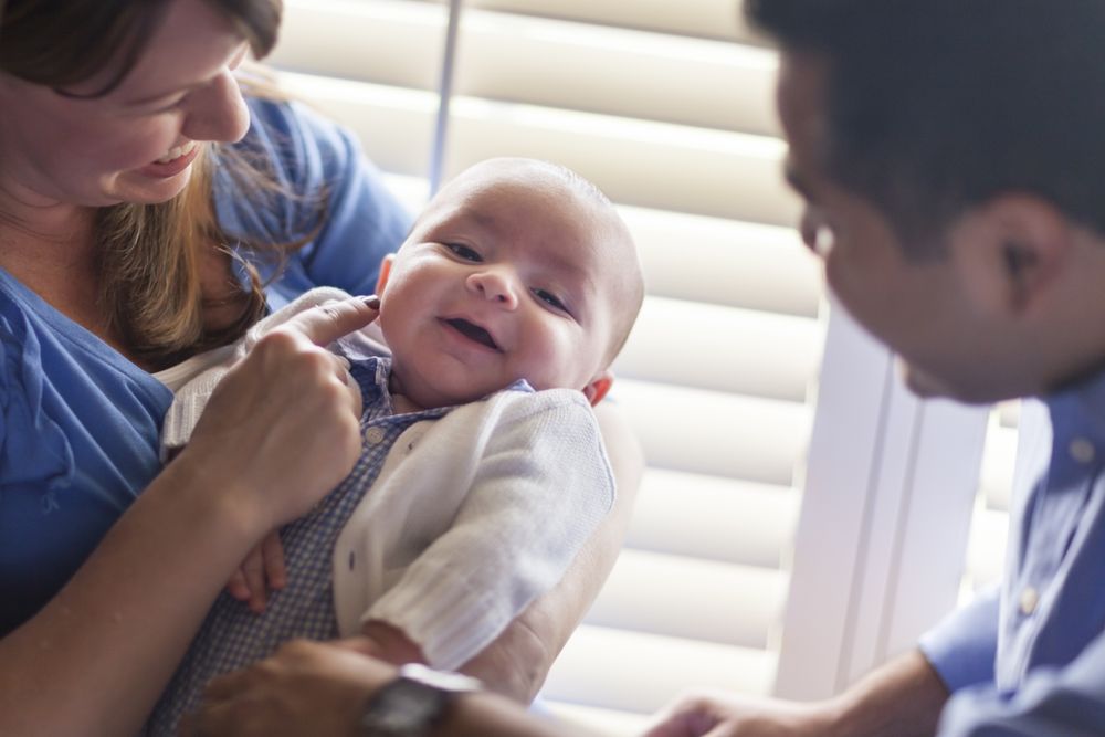 Couple Enjoying Their Newborn Son