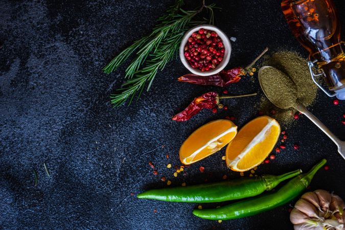 Counter with aromatics, seasonings and orange