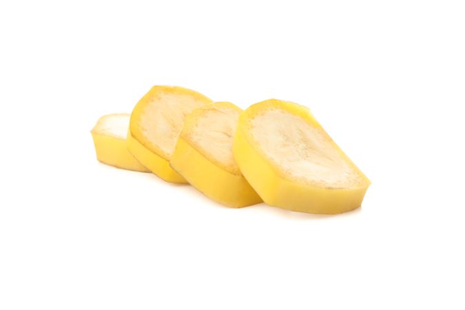 Banana slices isolated on blank background. Fresh fruit