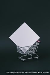 Shopping cart with square box on dark background 49koW0