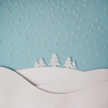 Christmas winter landscape with snowy hills and trees