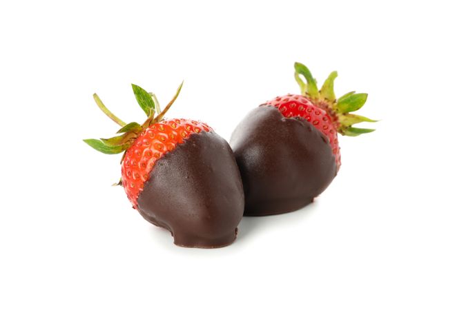 Chocolate fondue. Strawberry in chocolate isolated on blank background