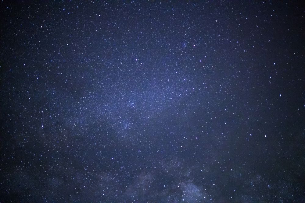 milky way galaxy with cloud and space dust in the universe, Long exposure photograph, with grain.