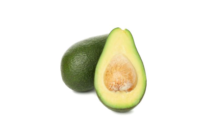 Ripe fresh avocado isolated on plain background