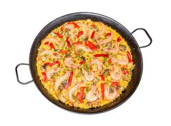 Traditional spanish paella cooked in a pan