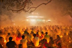 People gathering outdoor at night attending Hindu religious festival Rakher Upobash in Narayanganj, Bangladesh 4AX2W5