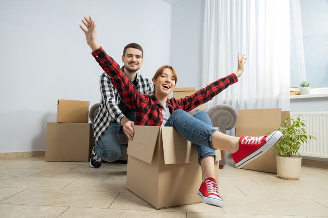 Concept of move with a happy young couple