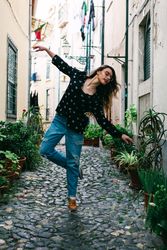 woman dancing on street