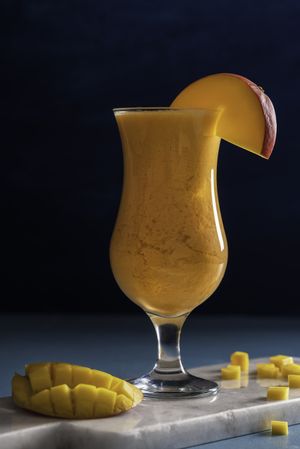 Tropical mango smoothie in a glass
